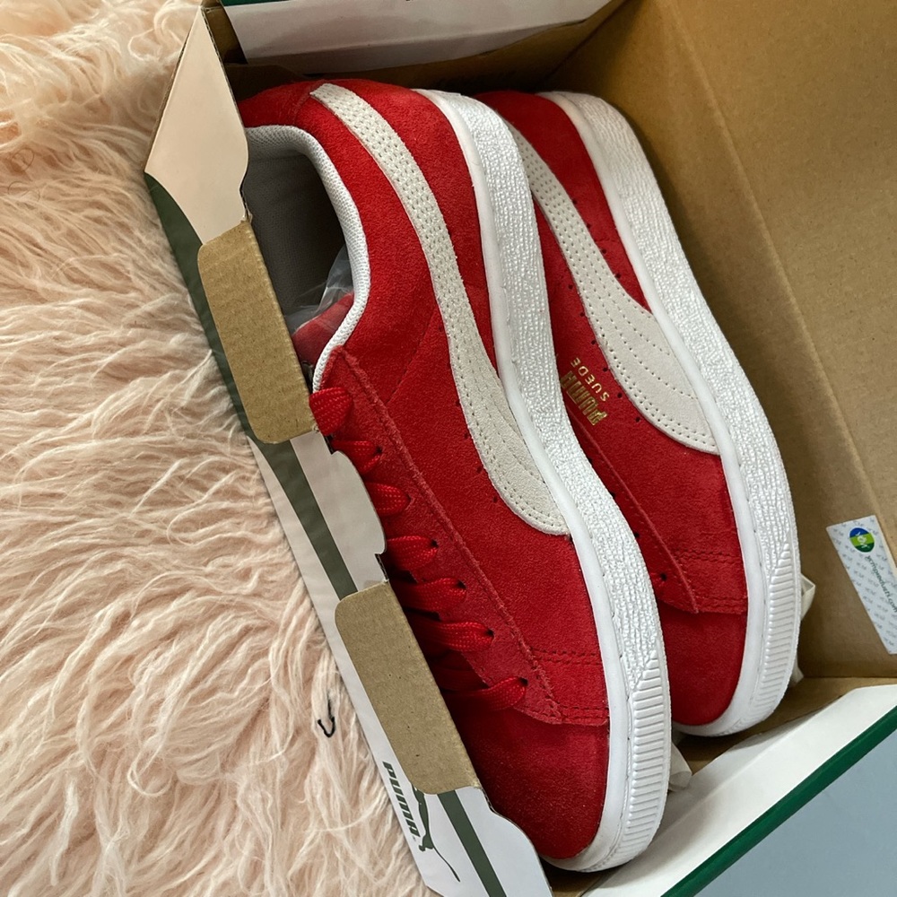 Red Puma suede sneakers